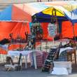 Souvenir stand set up on dock for ship passengers.